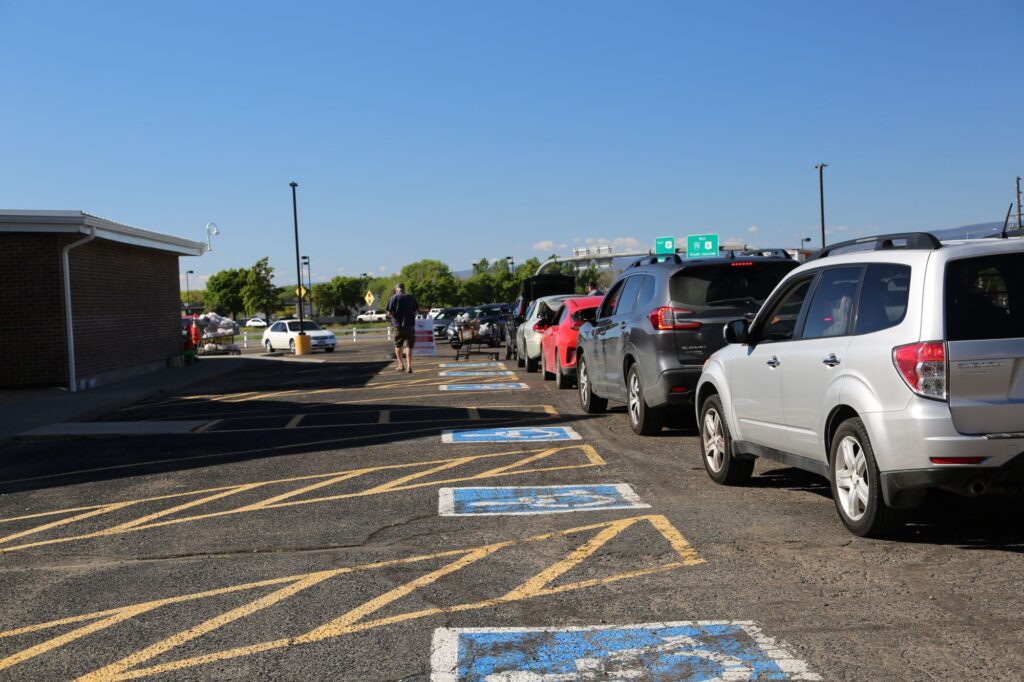 line of cars waiting for food at food pantry