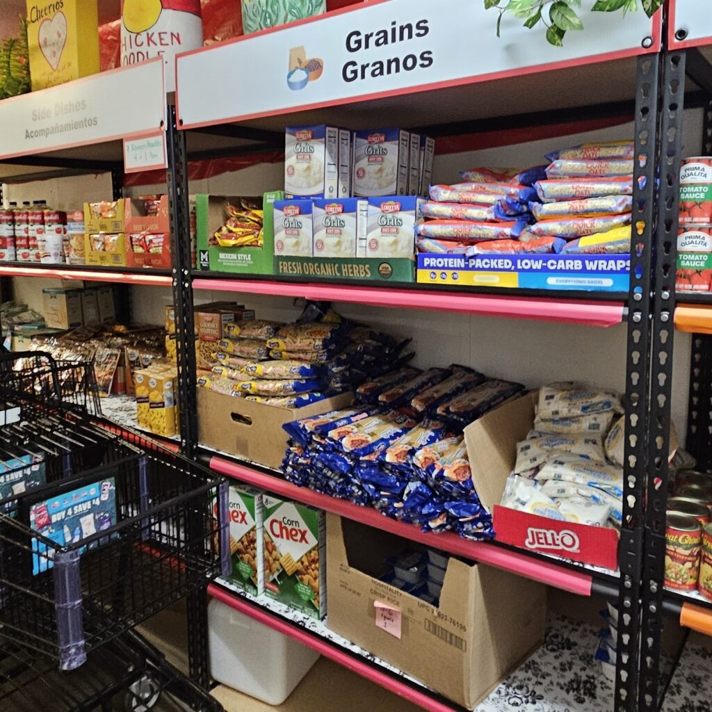 shelves of grains and pasta at food pantry